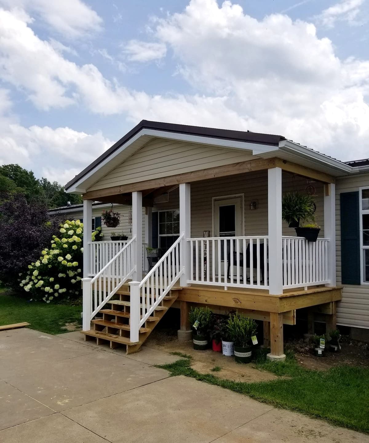 Covered front porch addition by Gene Laughner Construction in Erie, PA