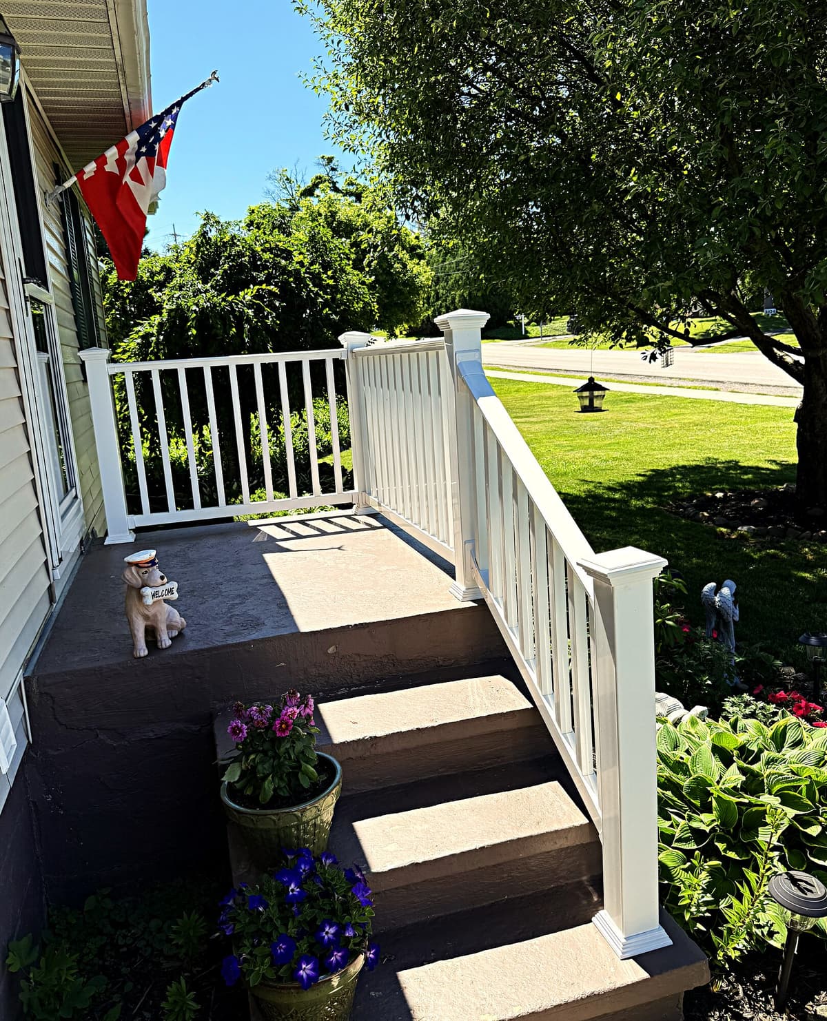 Vinyl porch railing and steps by Gene Laughner Construction in Erie, PA