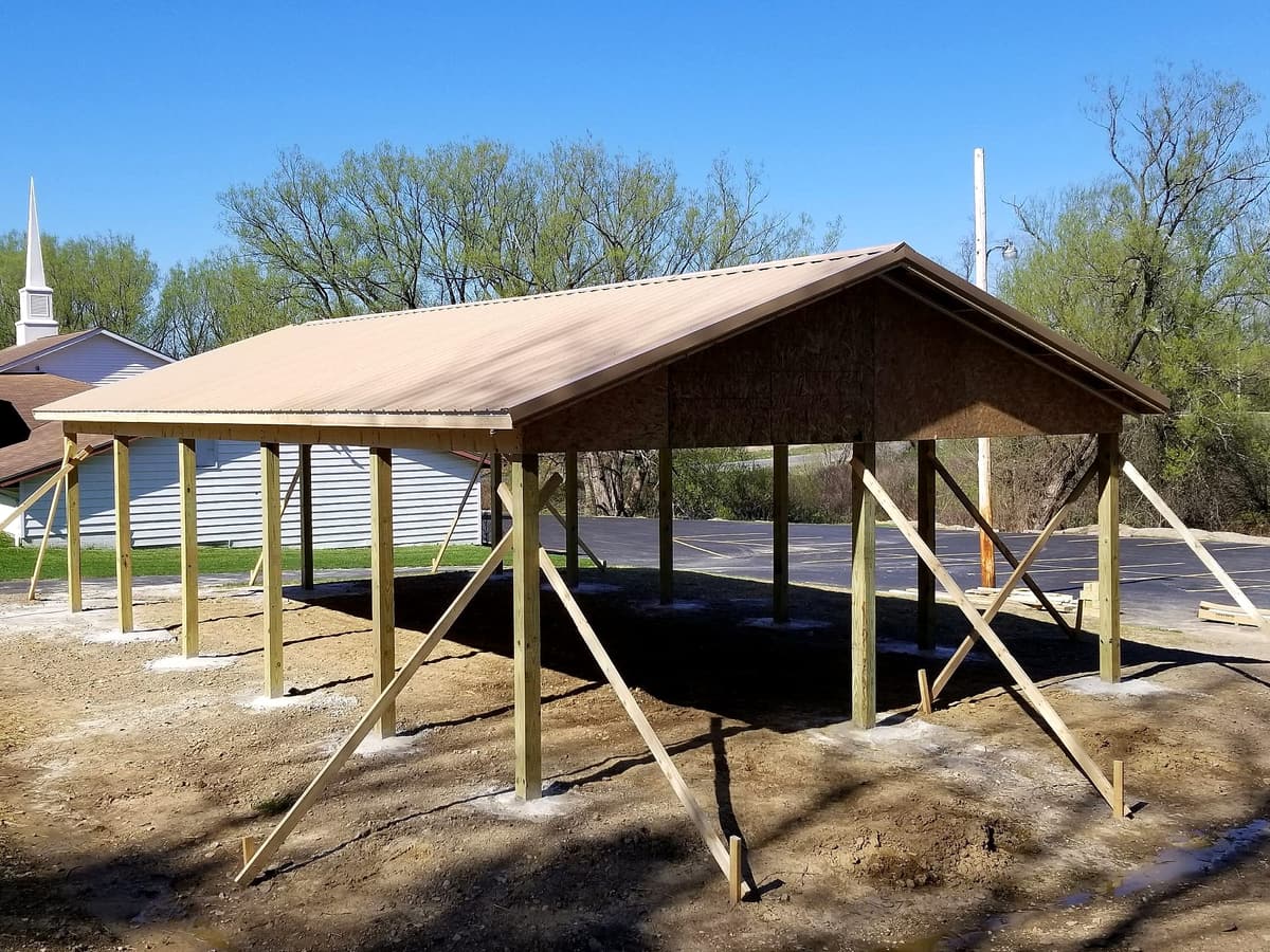 Open-air timber pavilion by Gene Laughner Construction in Erie, PA