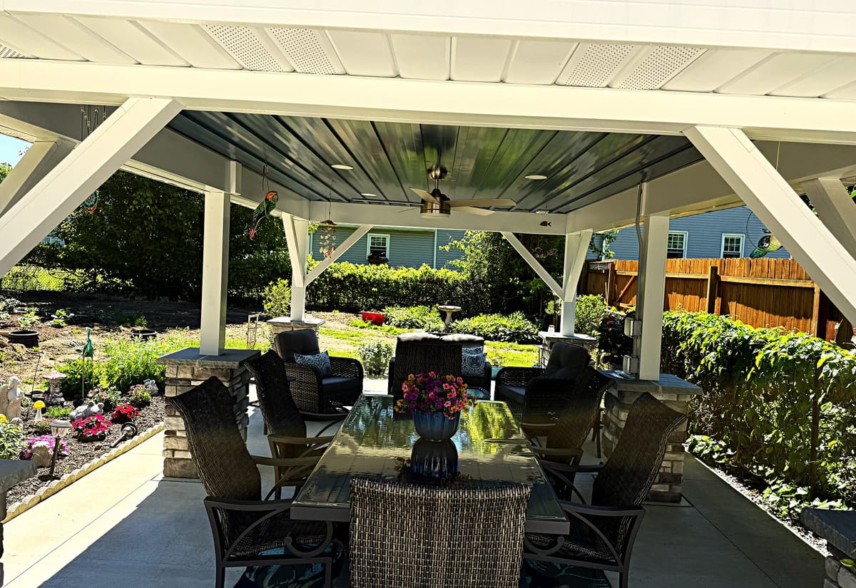Covered outdoor dining and entertaining space built by Gene Laughner Construction in Erie, NW PA