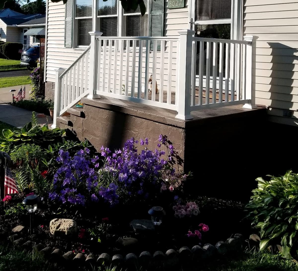 Front porch with vinyl railings by Gene Laughner Construction in Erie, PA