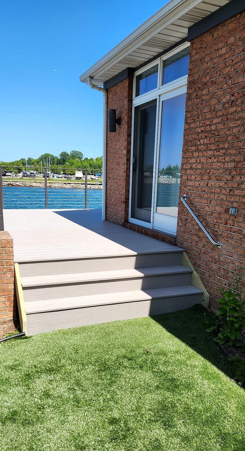 Waterfront composite deck and steps by Gene Laughner Construction in Erie, PA
