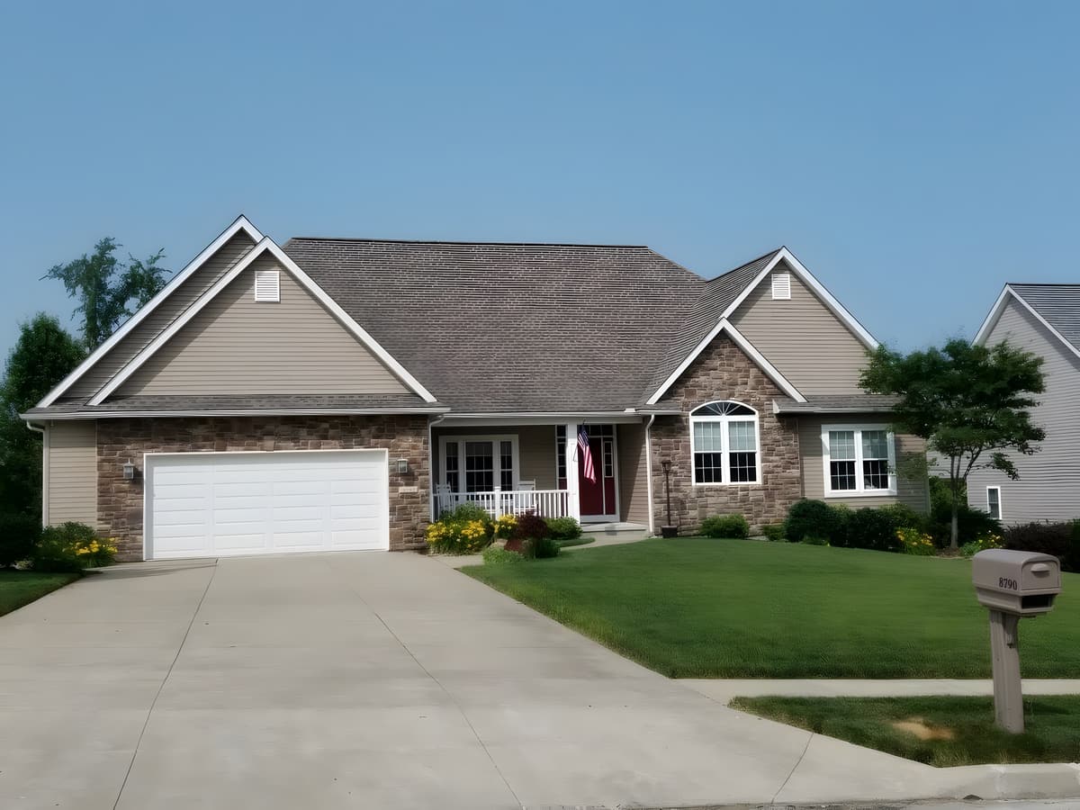 Custom home, stone & siding by Gene Laughner Construction in Erie, PA