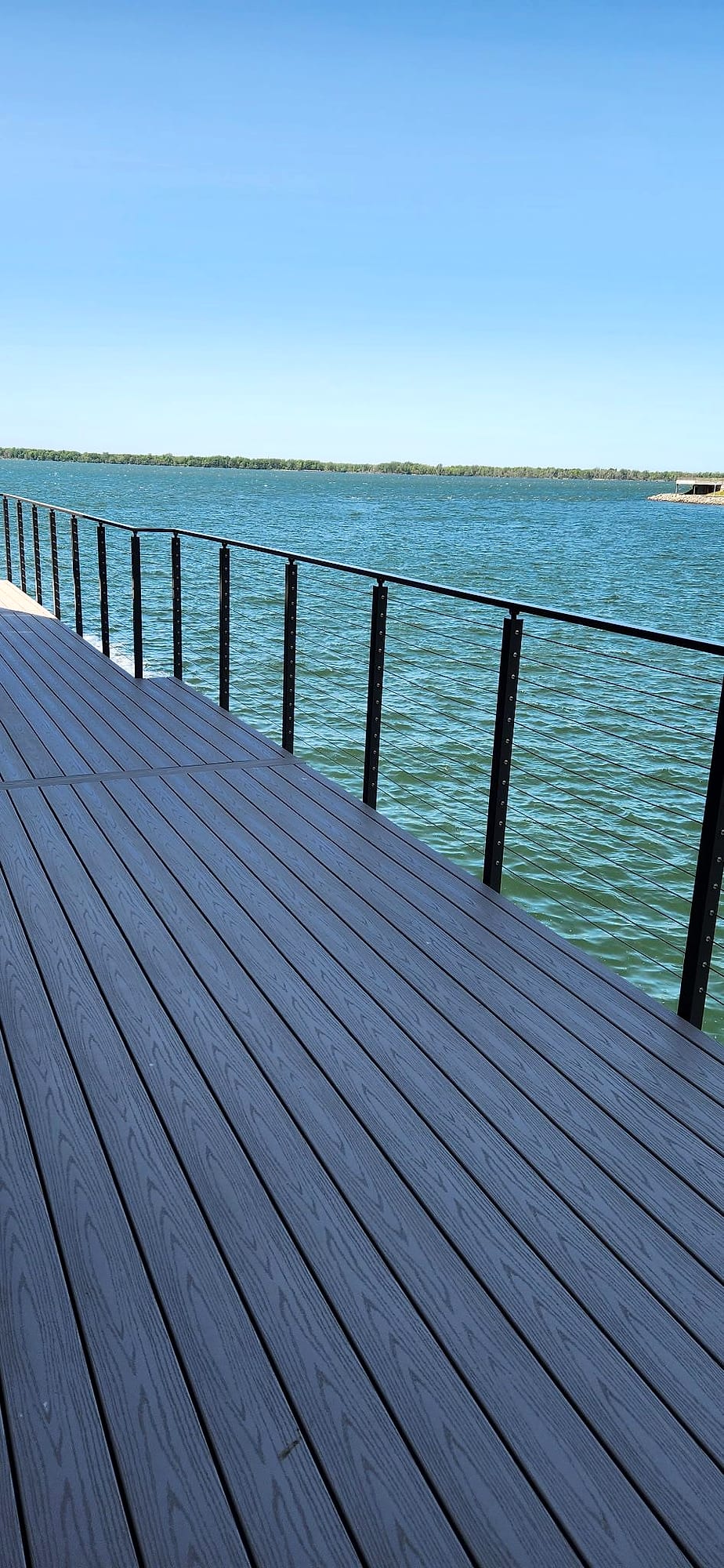 Lakefront deck with cable railing built by Gene Laughner Construction near Presque Isle in Erie, Northwest PA